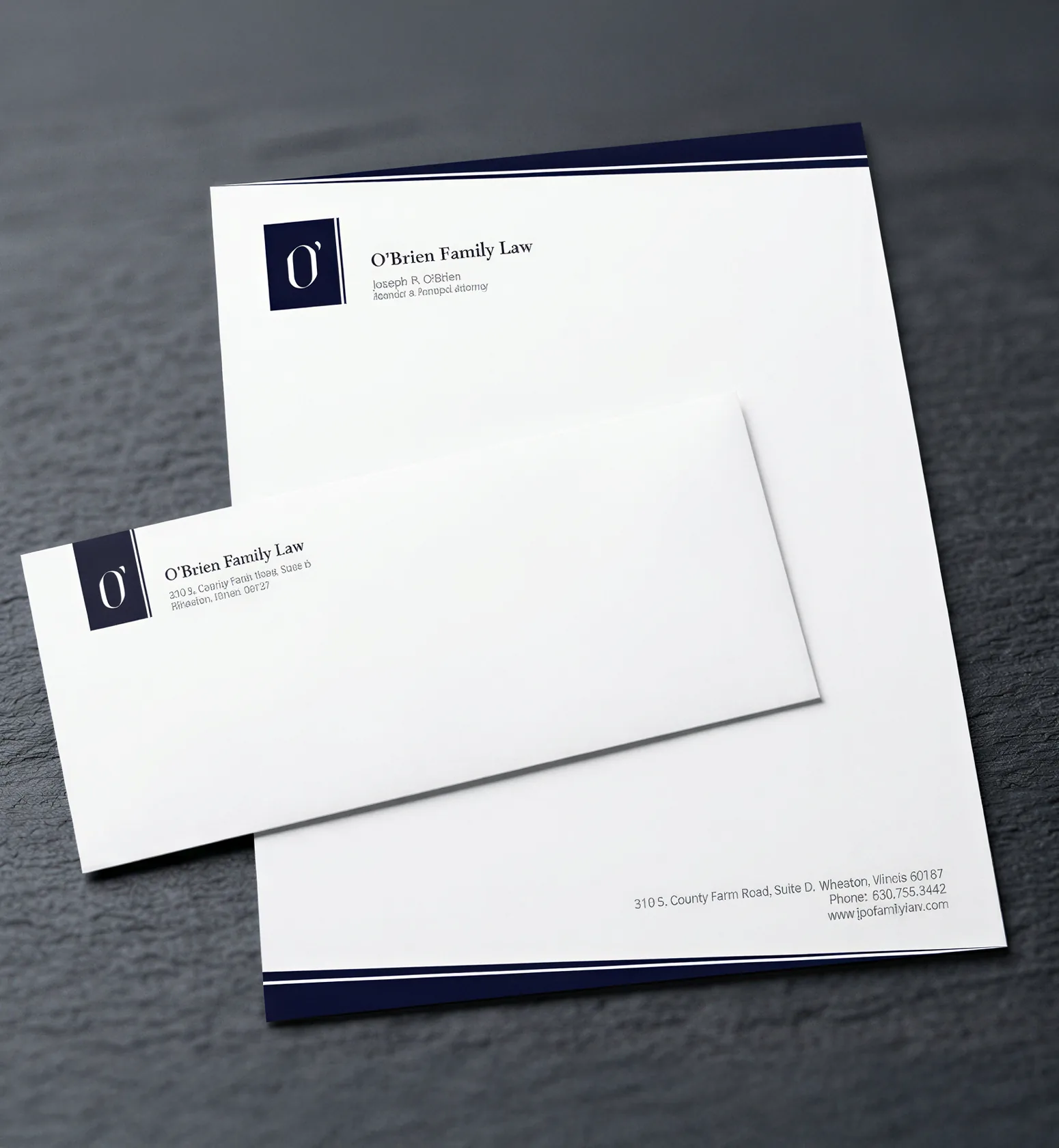O’Brien Family Law letterhead and envelope with the navy O’ monogram