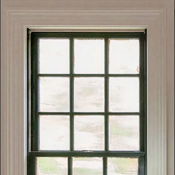 Black-frame window with painted casing